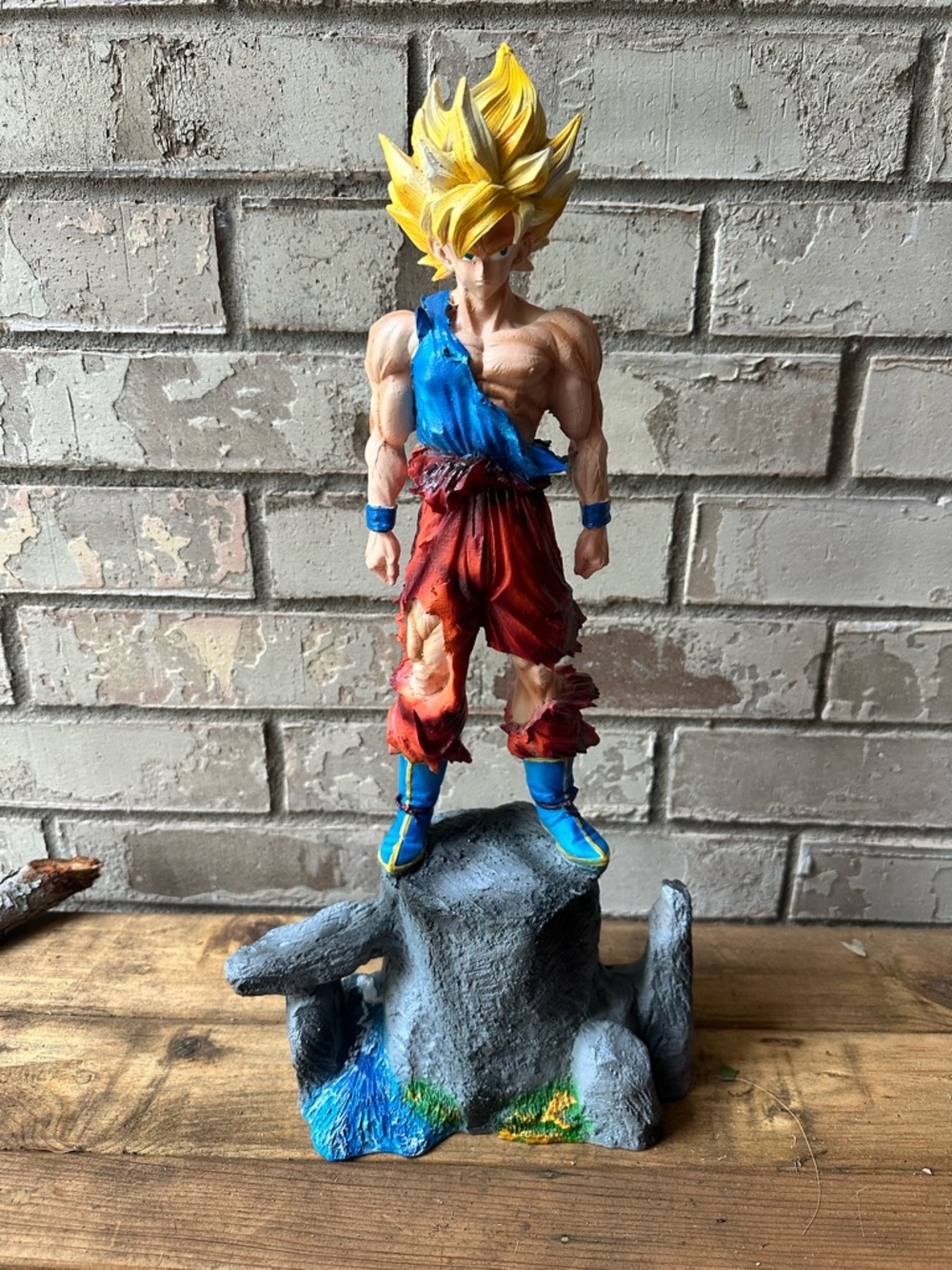 Super Saiyan Goku Figurine with Yellow Hair and Red-Blue Outfit